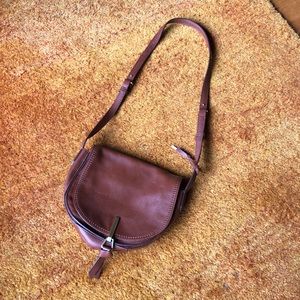 Brown leather Vera Bradley saddle bag  gold metal details